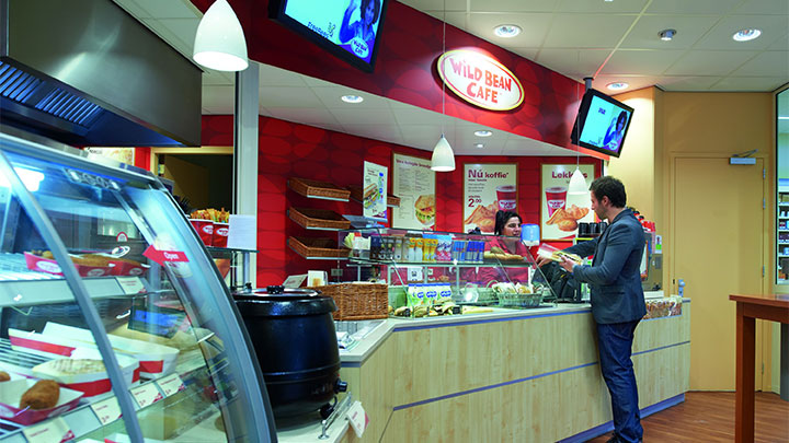 Shop in a petrol station lit with Philips shop lighting