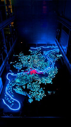 display the urban evolution of a city with light