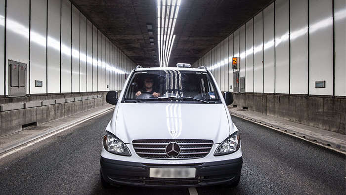 Car passing the Meir tunnel 