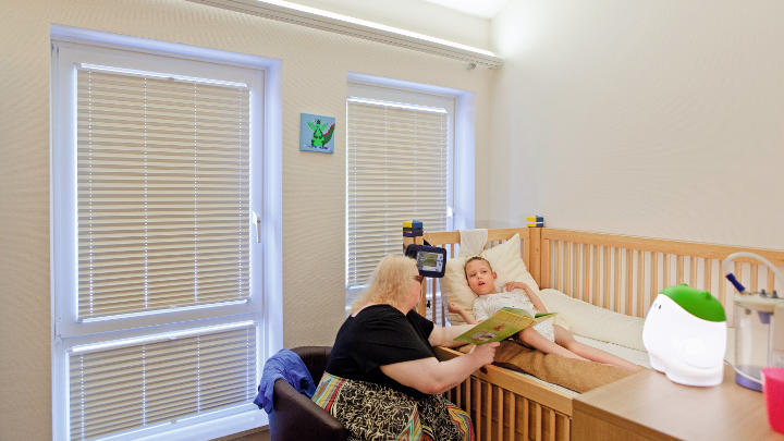 Patient room lit up by Philips Lighting