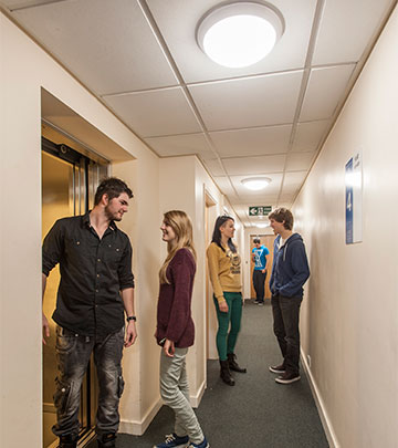 The corridor in Unite occupied with people