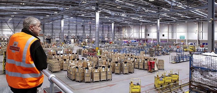 A warehouse hall lit up by Philips lighting